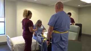 Physical Therapy Transfer Training  How To Transfer From Wheelchair To Bed [upl. by Ettenal521]