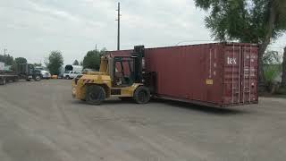 Moving a 40 High Cube Shipping Container with a Forklift [upl. by Saravat]